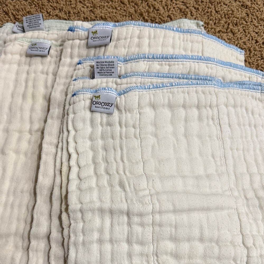 Cream Quilted Baby Cloths with Blue Trim